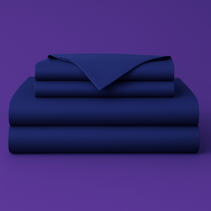 This image shows a neatly folded stack of navy blue bed sheets on a vibrant purple background. The stack includes what appears to be a fitted sheet, flat sheet, and pillowcases. The sheets have a smooth, crisp appearance suggesting high-quality bedding. The top sheet has a folded corner revealing the edge detail.