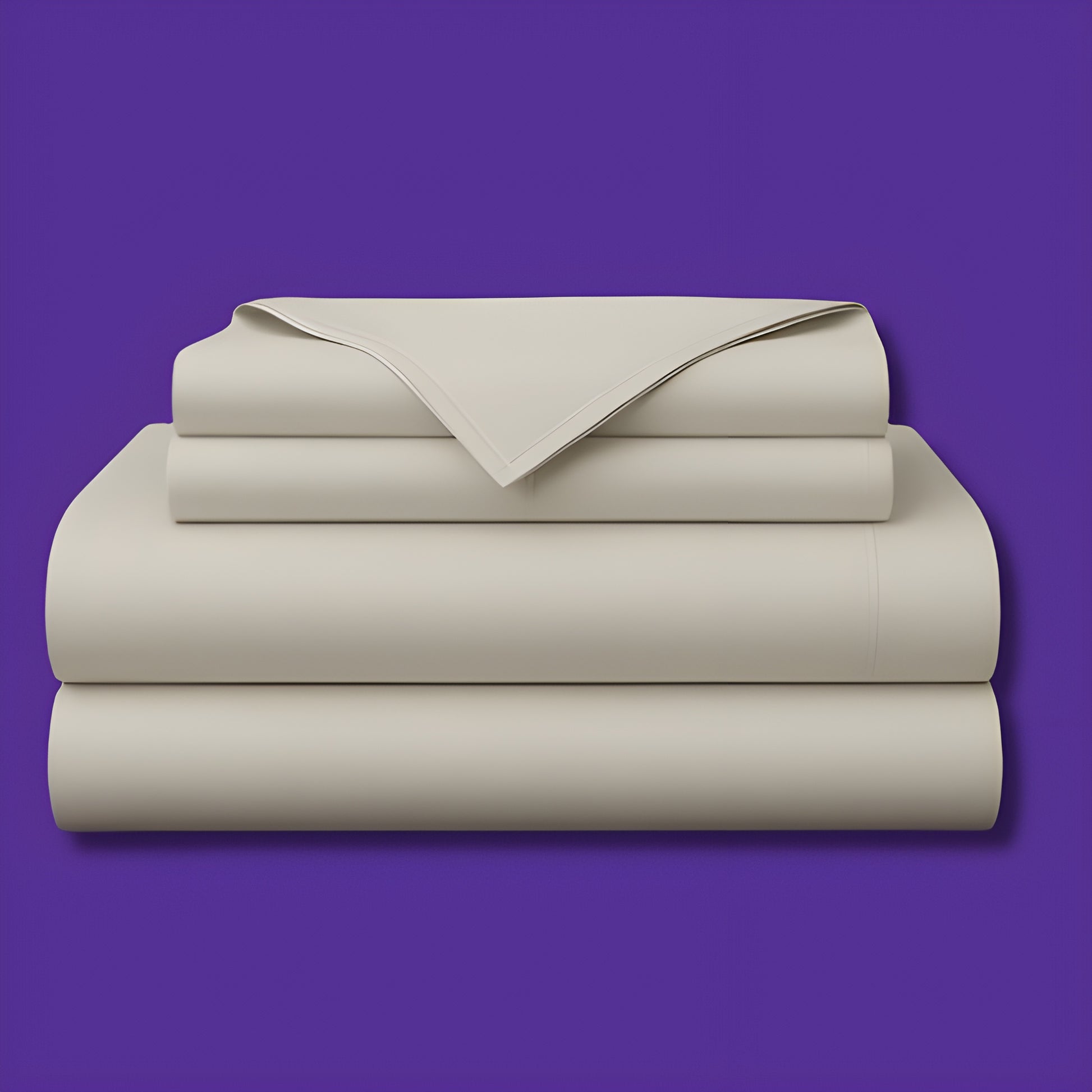 This image shows a neatly folded stack of cream-colored bed sheets on a vibrant purple background. The stack includes what appears to be a fitted sheet, flat sheet, and pillowcases. The sheets have a smooth, crisp appearance suggesting high-quality bedding. The top sheet has a folded corner revealing the edge detail.