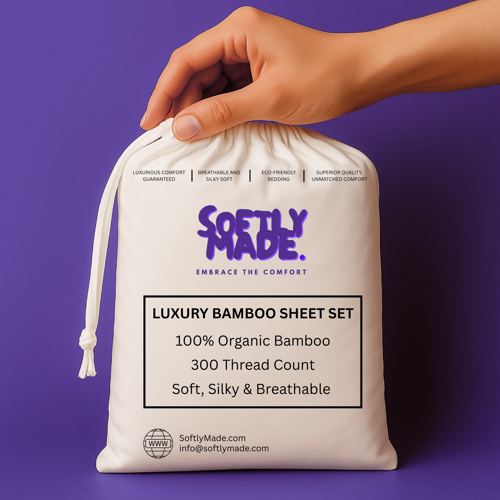 Hand touching a white drawstring storage bag with SoftlyMade branding against purple background. The bag displays 'Luxury Bamboo Sheet Set' with product details including 100% Organic Bamboo, 300 Thread Count, Soft Silky & Breathable, King size, and website contact information.